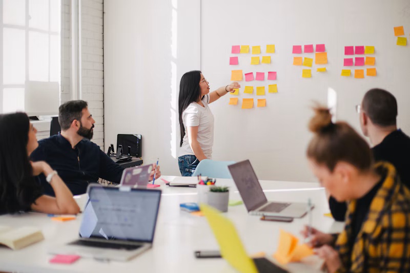 Colleagues discussing marketing strategy in a meeting