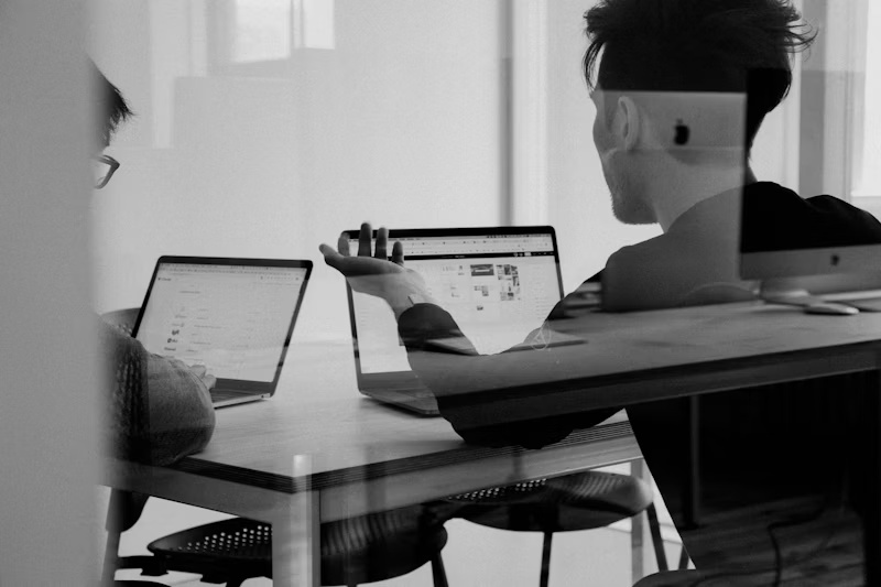 Team members reviewing a project together